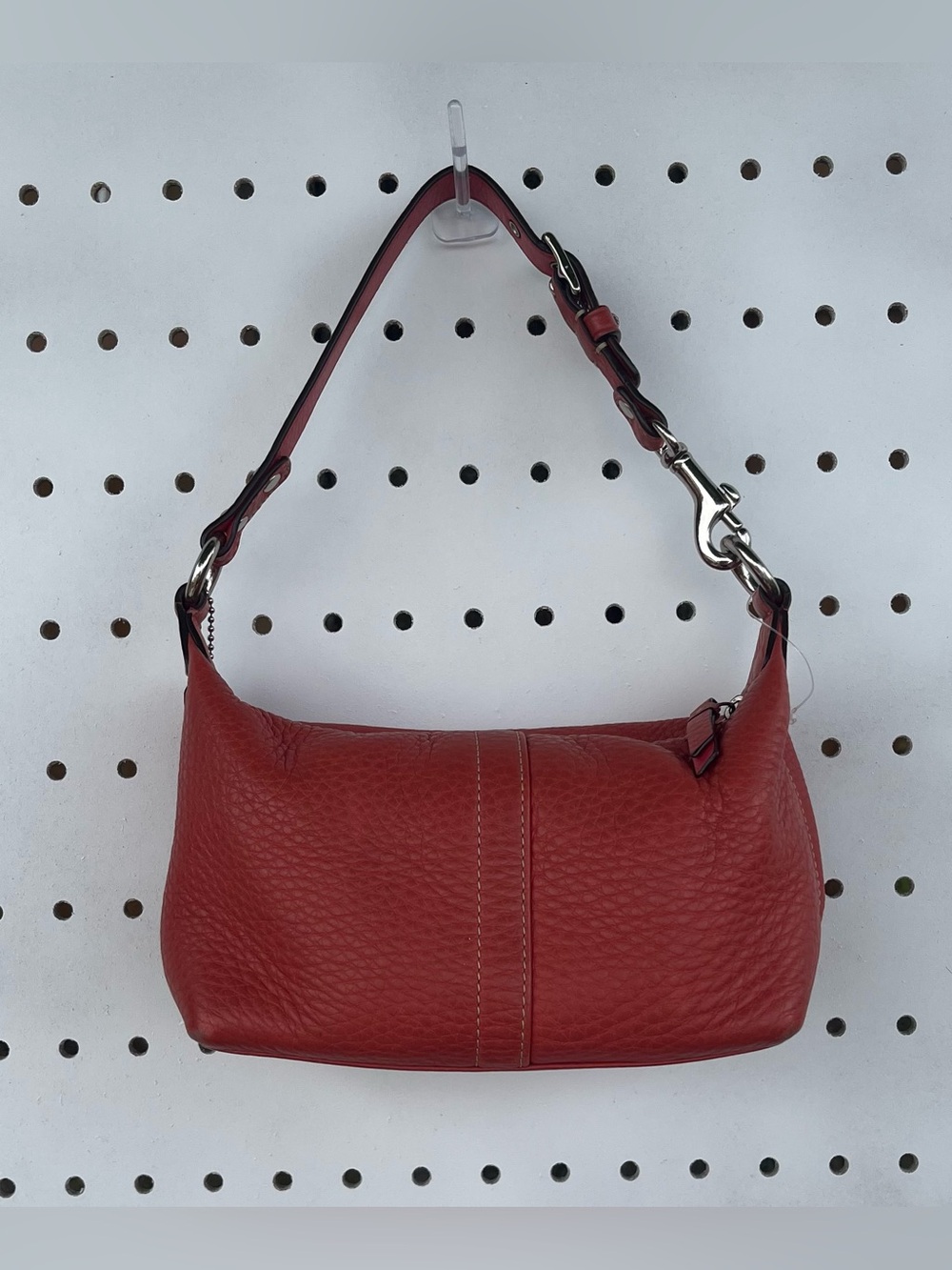 Mini Coach Coral Pebbled Leather shoulder bag.